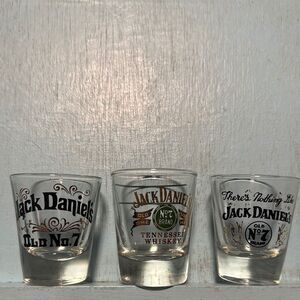 Three Jack Daniel's Shot Glass Each one is different.  Great for man cave decor